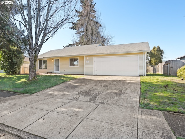 ranch-style home with an attached garage, driveway, a front lawn, and fence