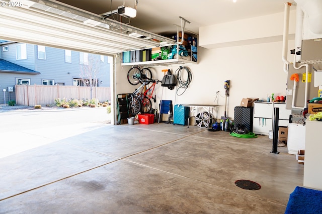 garage featuring a garage door opener