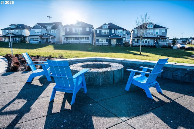 view of patio featuring an outdoor fire pit