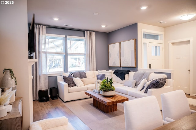 living room featuring light hardwood / wood-style floors