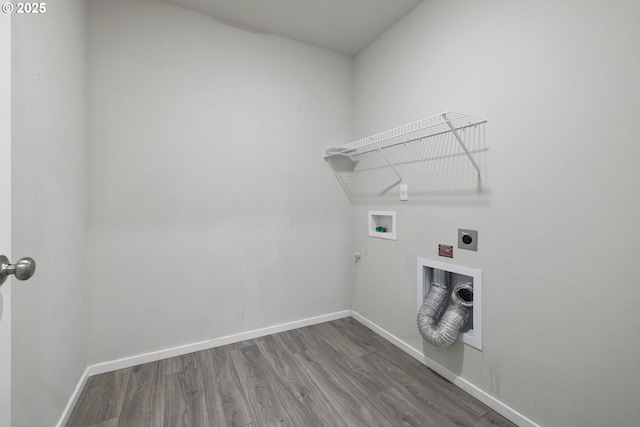 laundry room featuring hardwood / wood-style floors, gas dryer hookup, electric dryer hookup, and washer hookup