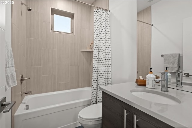 full bath featuring shower / bath combination with curtain, toilet, and vanity