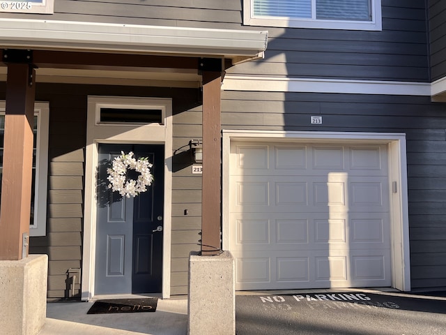 entrance to property with a garage