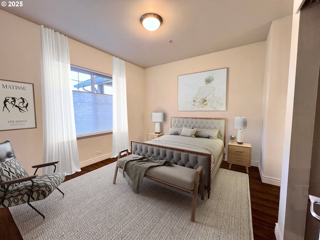 bedroom featuring dark hardwood / wood-style floors