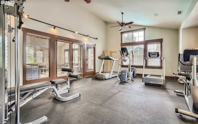 workout area with ceiling fan and vaulted ceiling