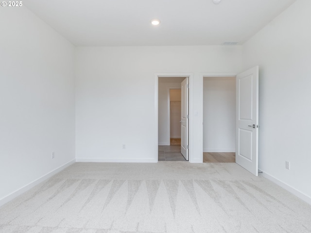 356 NW 29th Way, Battle Ground, WA 98604 - unfurnished bedroom featuring carpet, a spacious closet, recessed lighting, and baseboards