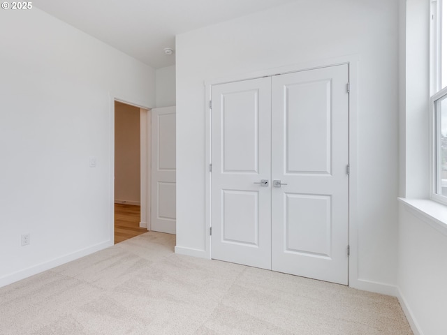 356 NW 29th Way, Battle Ground, WA 98604 - unfurnished bedroom featuring carpet flooring, a closet, and baseboards