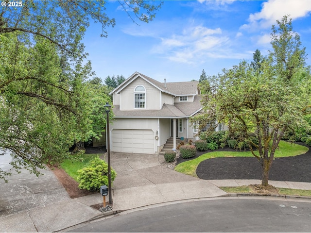 20198 SW Tillamook Ct, Tualatin, OR 97062 - traditional-style house featuring a garage, roof with shingles, and concrete driveway