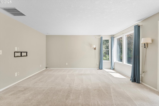 20198 SW Tillamook Ct, Tualatin, OR 97062 - unfurnished room with a textured ceiling and light colored carpet
