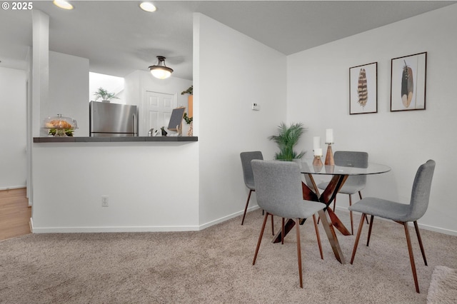 1535 SW Clay St Unit 238, Portland, OR 97201 - carpeted dining space featuring baseboards and recessed lighting