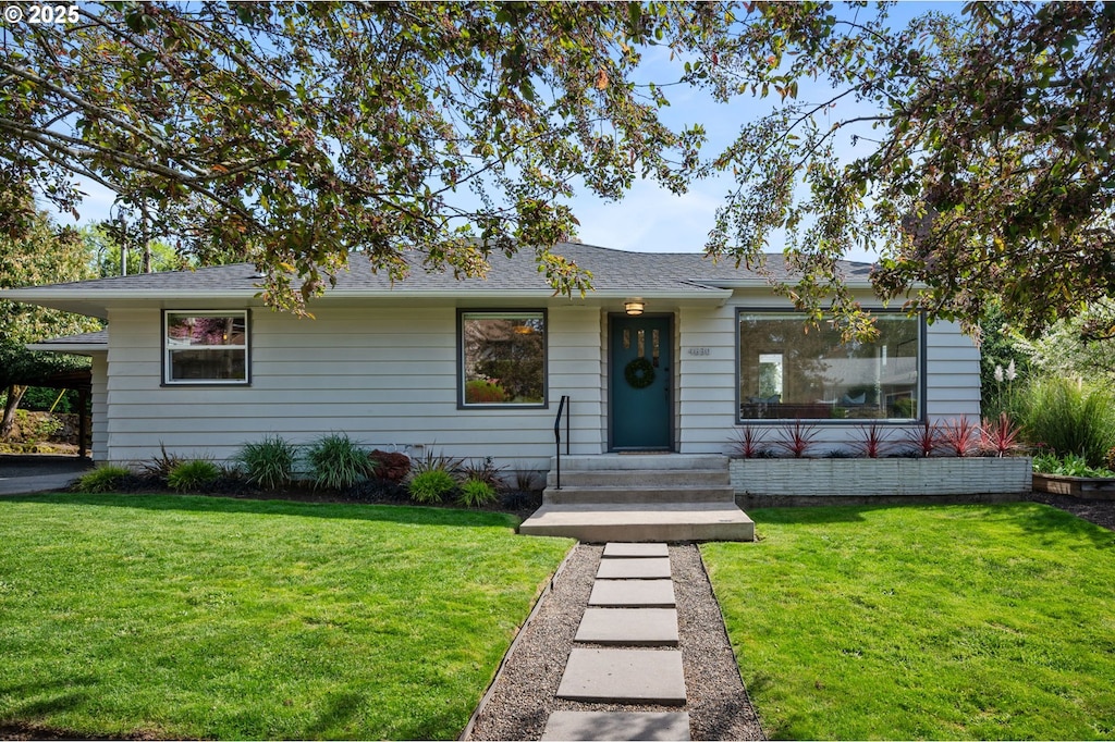 4630 SW Pendleton St, Portland, OR 97221 - single story home with a front lawn