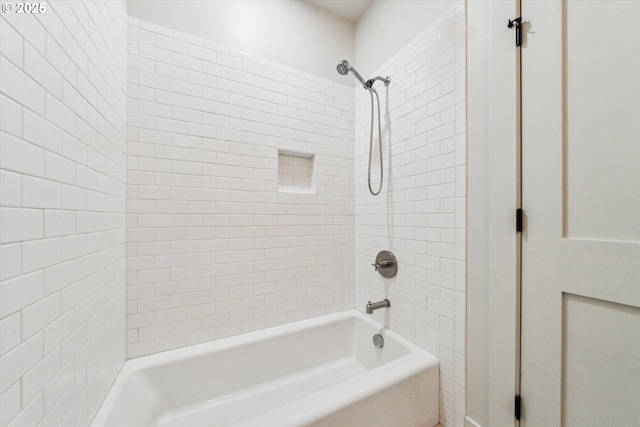full bath featuring  shower combination