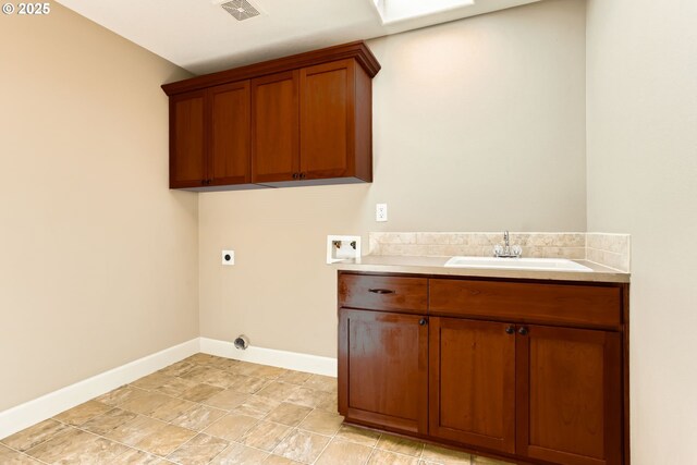 14702 SE Badger Creek Rd, Happy Valley, OR 97086 - washroom featuring electric dryer hookup, washer hookup, and cabinet space