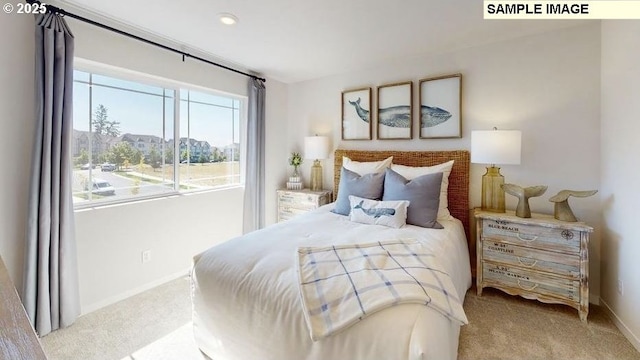 carpeted bedroom with baseboards