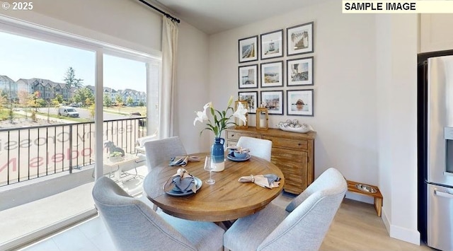 dining space with baseboards