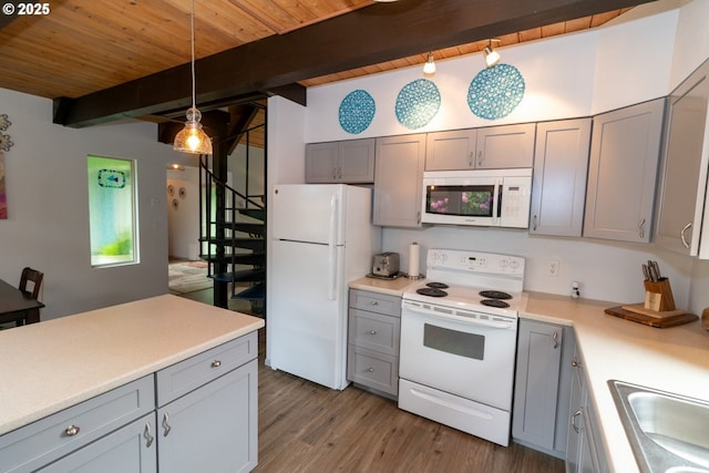 1896 W Park Dr, Florence, OR 97439 - kitchen featuring white appliances, gray cabinets, light countertops, wood ceiling with exposed beams, and decorative light fixtures