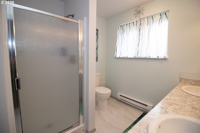 1896 W Park Dr, Florence, OR 97439 - bathroom featuring baseboard heating, a stall shower, toilet, and double vanity