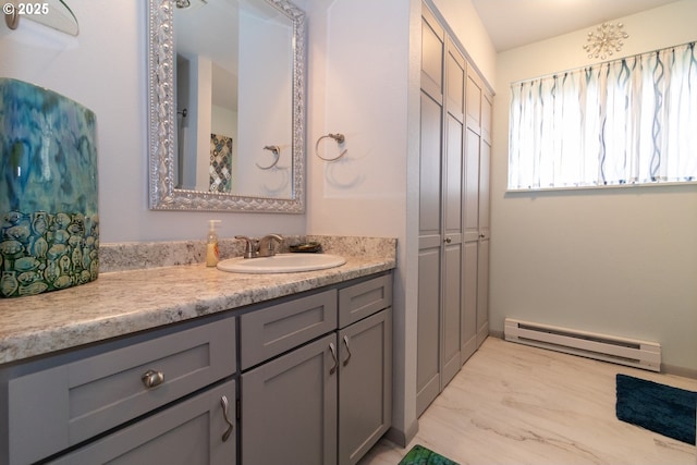 1896 W Park Dr, Florence, OR 97439 - bathroom with baseboard heating and vanity