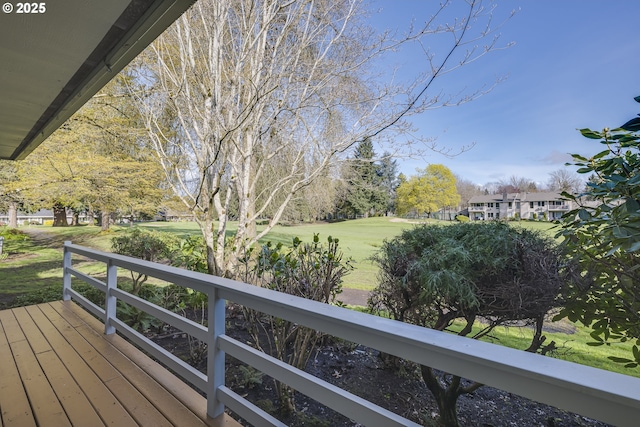 deck featuring a lawn