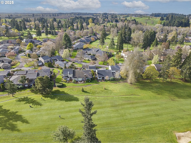 birds eye view of property with a residential view