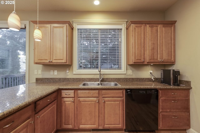 kitchen featuring hanging light fixtures, recessed lighting, dishwasher, and a sink