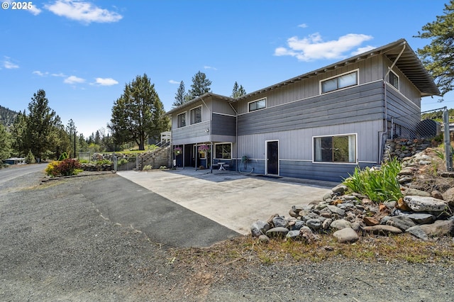 204 Adam Dr, Canyon City, OR 97820 - rear view of property with a patio