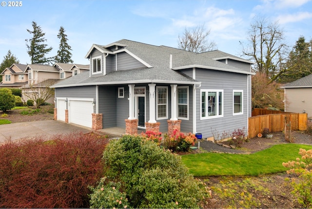 view of front of home with fence, driveway, a porch, an attached garage, and a shingled roof