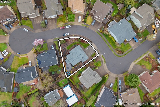 birds eye view of property with a residential view