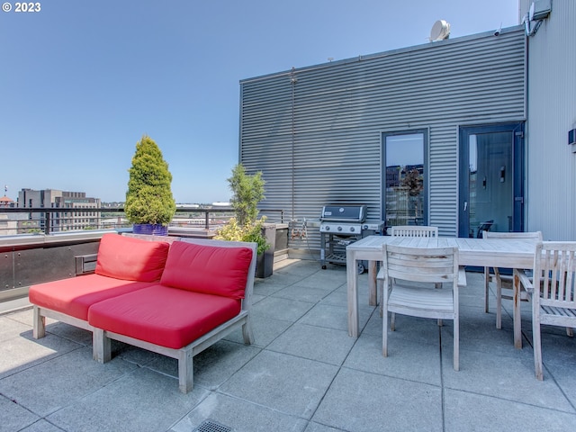 view of patio / terrace featuring grilling area and outdoor dining area