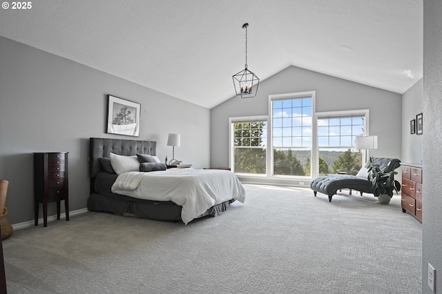 bedroom with carpet and lofted ceiling