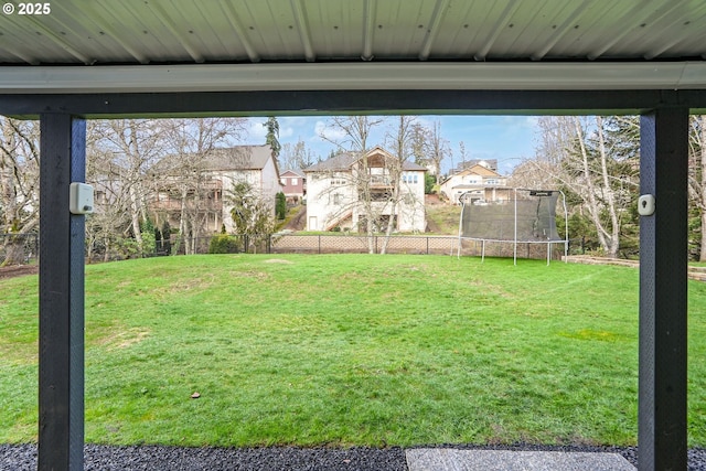 view of yard featuring a trampoline