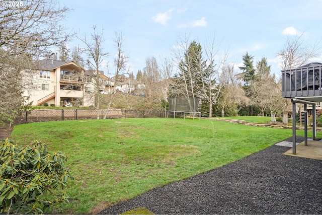 view of yard featuring a trampoline