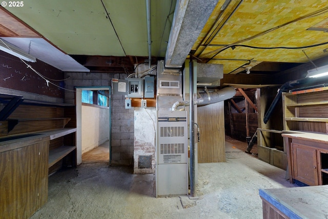 utility room with heating unit