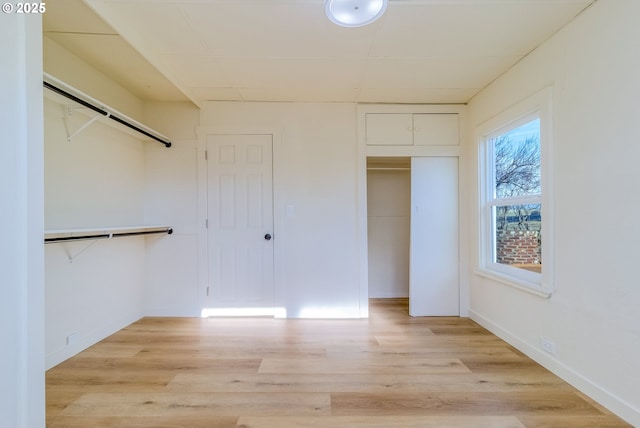 unfurnished bedroom featuring light hardwood / wood-style flooring