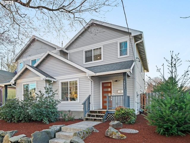 view of front of home with roof with shingles