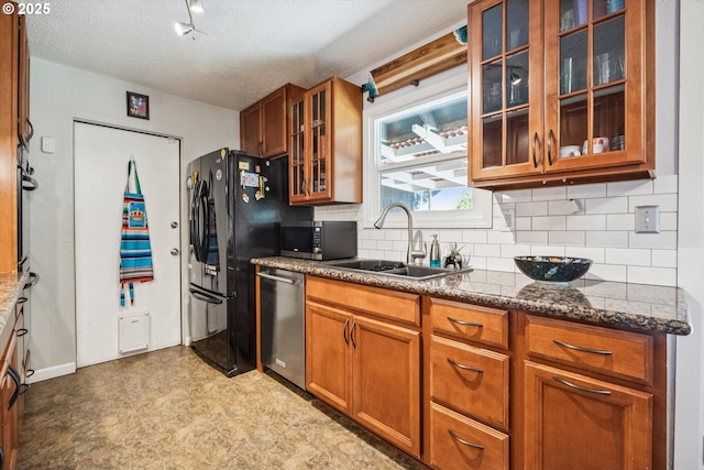 1903 SE 158th Ave, Portland, OR 97233 - kitchen with stainless steel appliances, decorative backsplash, brown cabinets, glass insert cabinets, and a textured ceiling