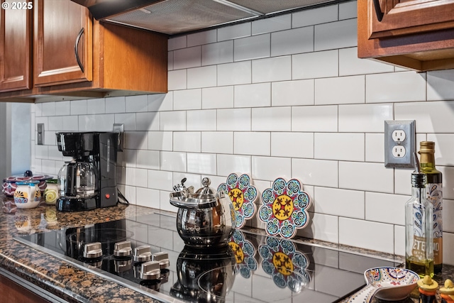 1903 SE 158th Ave, Portland, OR 97233 - kitchen with decorative backsplash, brown cabinetry, dark countertops, and custom range hood