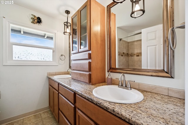 1903 SE 158th Ave, Portland, OR 97233 - full bathroom featuring double vanity and baseboards