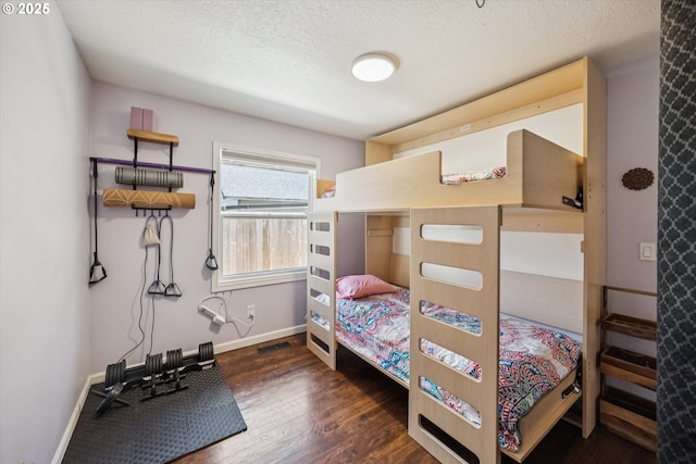 1903 SE 158th Ave, Portland, OR 97233 - bedroom featuring wood finished floors and a textured ceiling