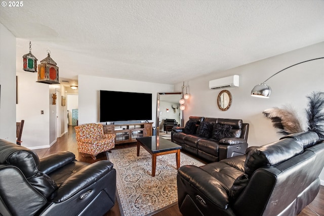 1903 SE 158th Ave, Portland, OR 97233 - living room with an AC wall unit, a textured ceiling, and wood finished floors