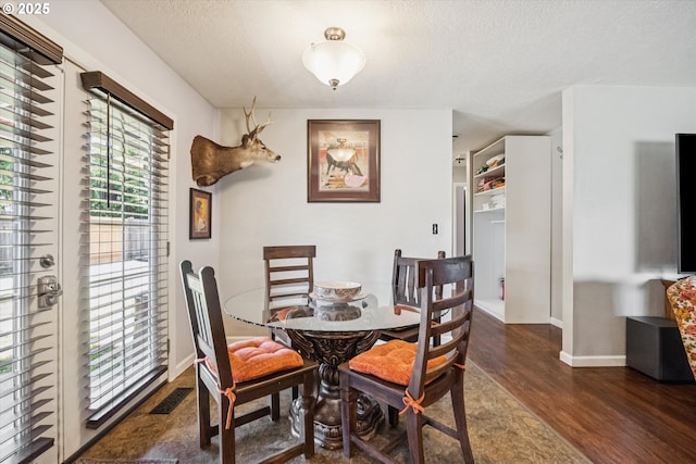1903 SE 158th Ave, Portland, OR 97233 - dining room with wood finished floors and a textured ceiling