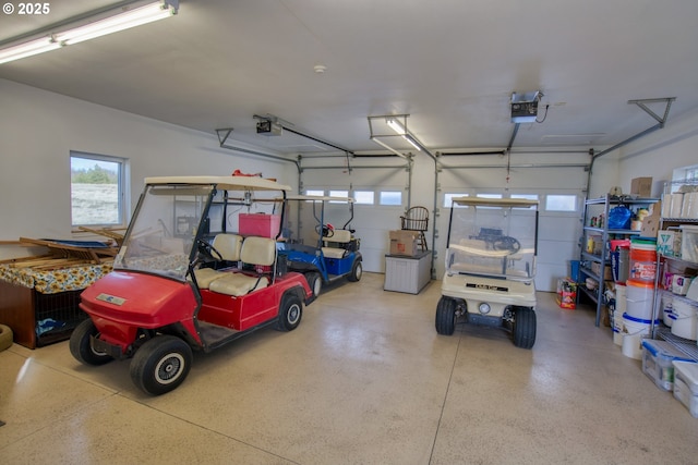 garage featuring a garage door opener