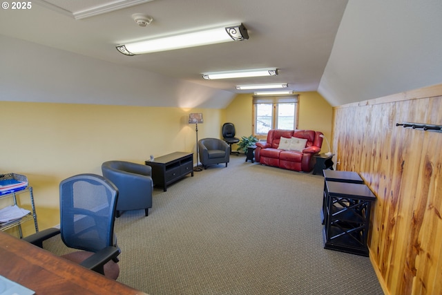recreation room with vaulted ceiling and carpet floors