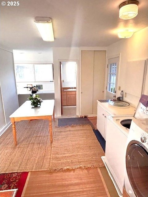 90726 Sanddollar Ln, Coos Bay, OR 97420 - kitchen featuring washer / dryer and light countertops