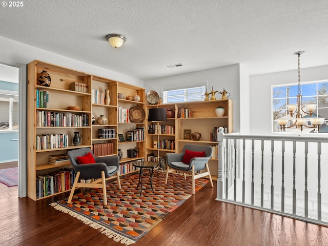 5417 N St, Washougal, WA 98671 - living area featuring a chandelier, wood-type flooring, healthy amount of natural light, and a textured ceiling