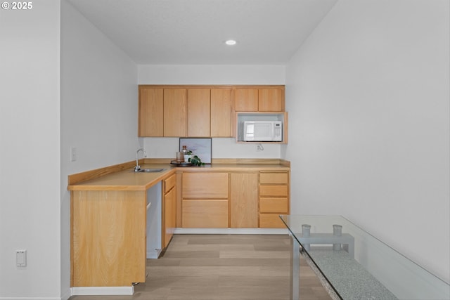 27917 NE 67th St, Camas, WA 98607 - kitchen featuring a sink, white microwave, light wood-style floors, light countertops, and light brown cabinets