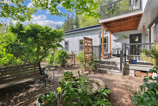 view of yard with a deck