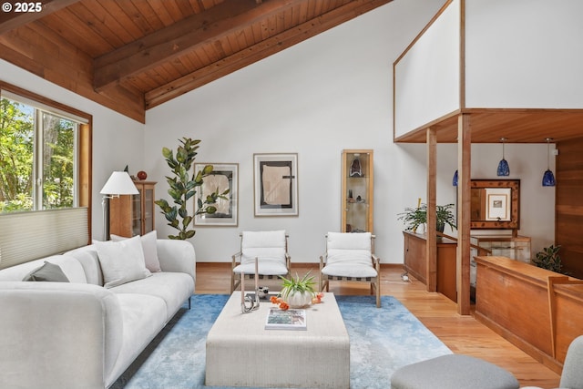 living room featuring wooden ceiling, baseboards, beamed ceiling, high vaulted ceiling, and light wood-style floors