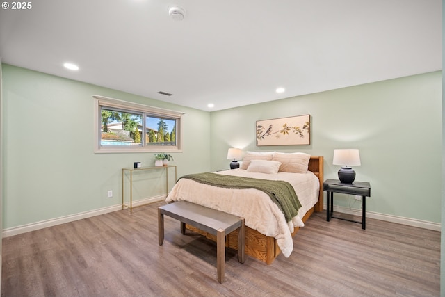 bedroom featuring light wood-type flooring