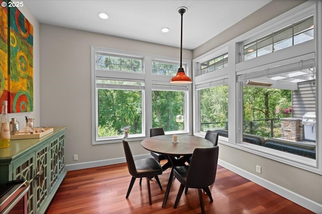 711 NW 94th Ter, Portland, OR 97229 - dining area featuring dark wood-type flooring and recessed lighting